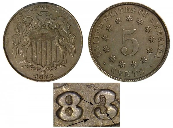 1883/2 Shield Nickel overdate close-up showing remnants of the 2 beneath the date digits under magnification